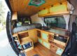 A custom van interior, built for comfort during a long road trip
