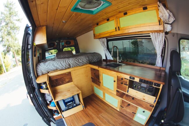 A custom van interior, built for comfort during a long road trip