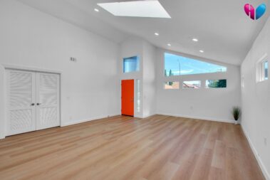 entryway with new flooring and fireplace demolition